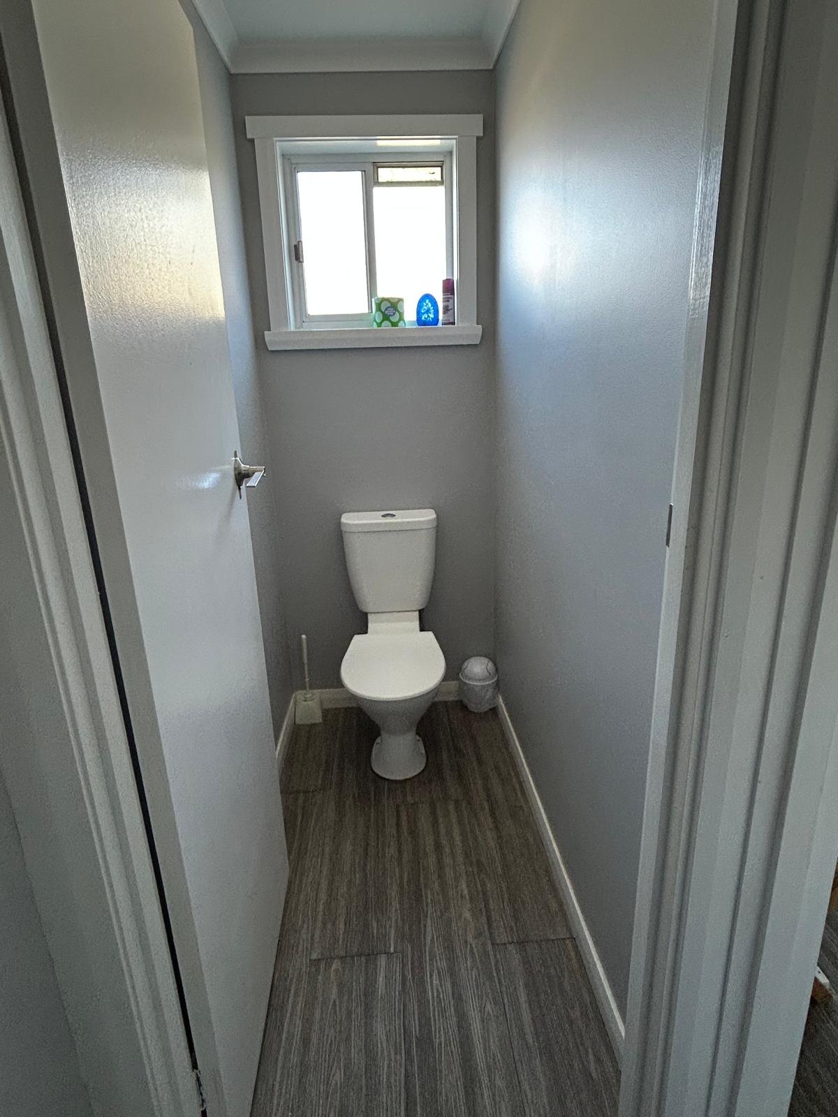 Separate toilet in Apartment One