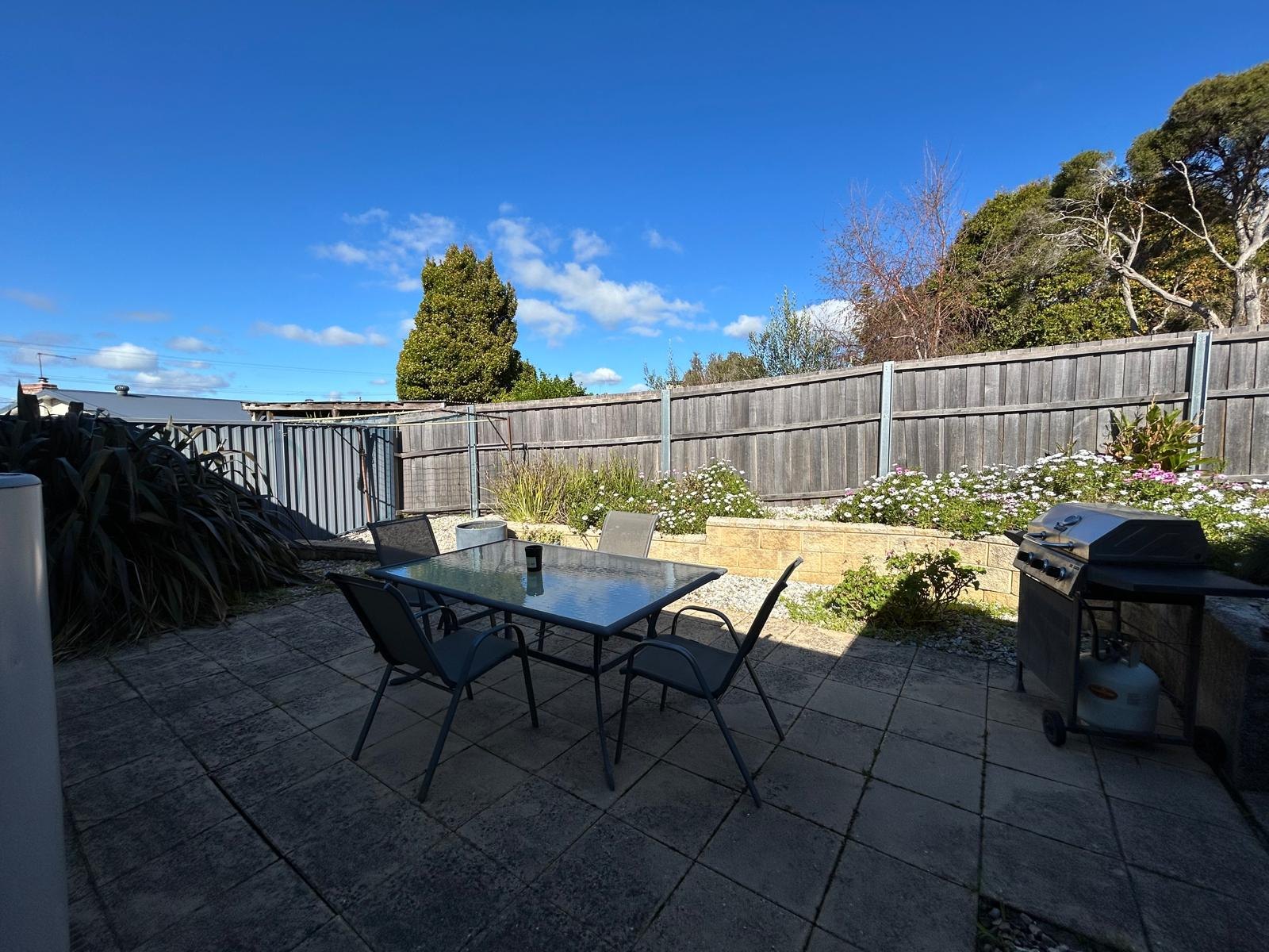 Private courtyard with barbeque and outdoor dining